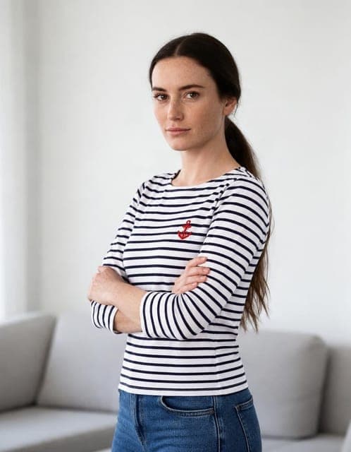 GPT Image 2.5 Flare (high): Breton stripes and red anchor copied, stripes continuing around the crossed arms, in all 3 runs